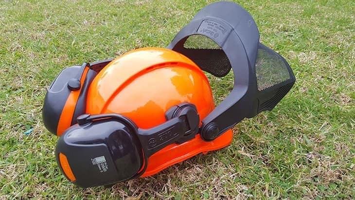 chainsaw helmet on grass