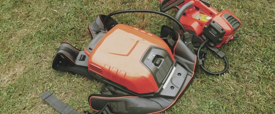 battery powered chainsaw with external backpack battery